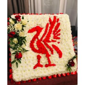 Artist-designed floral arrangement featuring the Football Artist Board emblem.