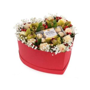 Heart-shaped Hat Box Ferrero Rocher with decorative flowers.