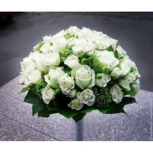 A bouquet of white roses with greenery, ideal for Wedding venues.